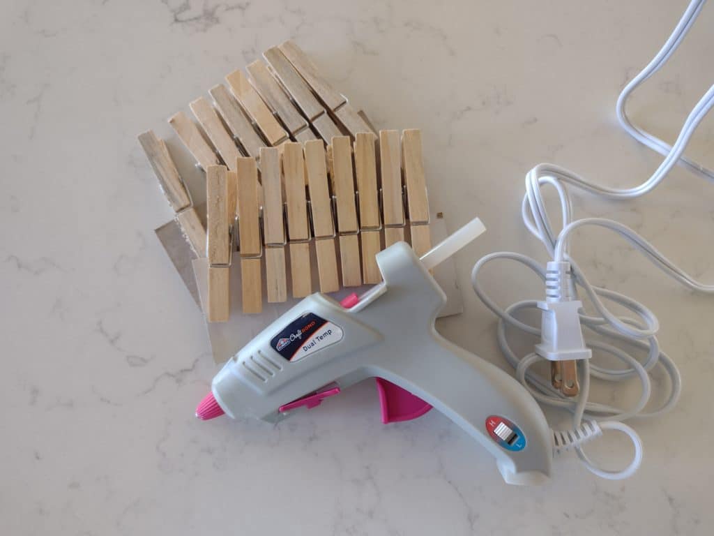 clothes hangers or pins and glue gun