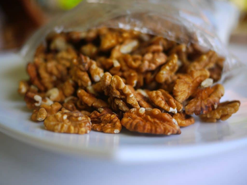 brown pecanson clear plastic container